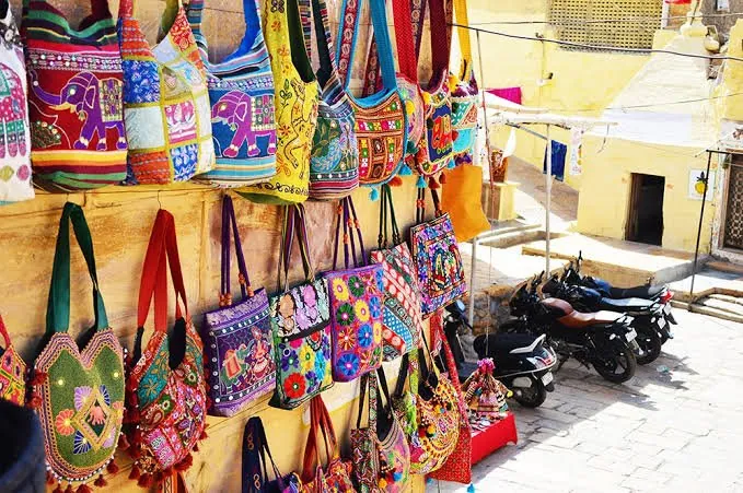 Colourful Rajasthani handicraft bags at a Jaisalmer market
